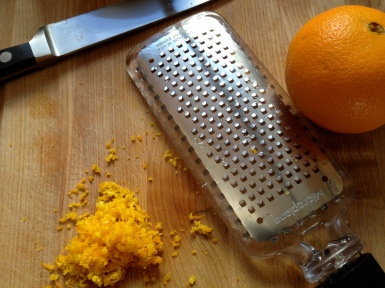 Grating the orange before juicing it