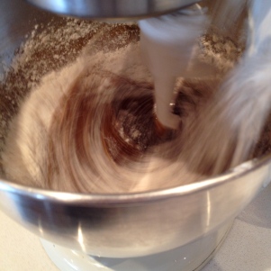 ... then buttermilk, followed at the end by the last portion of dry mix