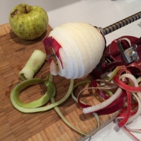 "Spinning" the apples to peel and core